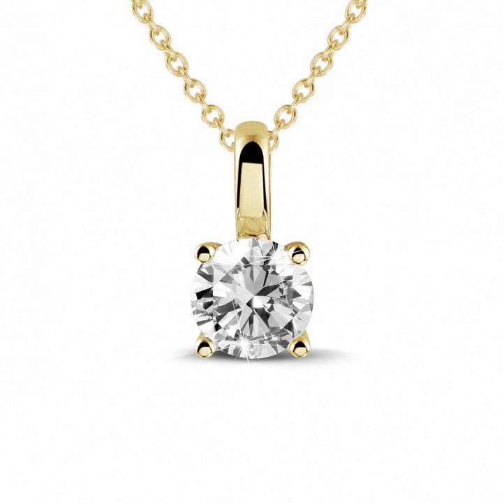 0.50 carat solitaire pendant in yellow gold with round diamond and four prongs