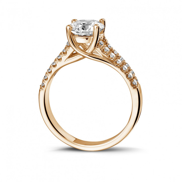 0.90 carat solitaire ring in red gold with side diamonds