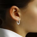 0.22 carat diamond creole earrings in white gold