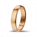 Wedding ring with a slightly domed surface of 5.00 mm in red gold