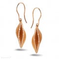 0.45 carat diamond design earrings in red gold
