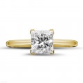 1.50 carat solitaire ring in yellow gold with princess diamond