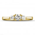 0.45 carat trilogy ring in yellow gold with round diamonds