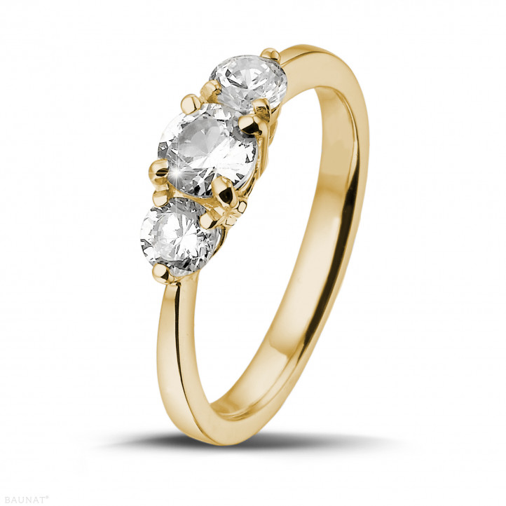 0.95 carat trilogy ring in yellow gold with round diamonds