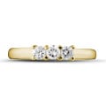 0.35 carat trilogy ring in yellow gold with round diamonds