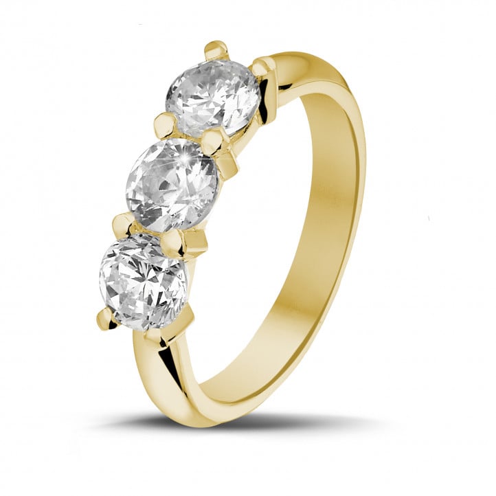 1.50 carat trilogy ring in yellow gold with round diamonds