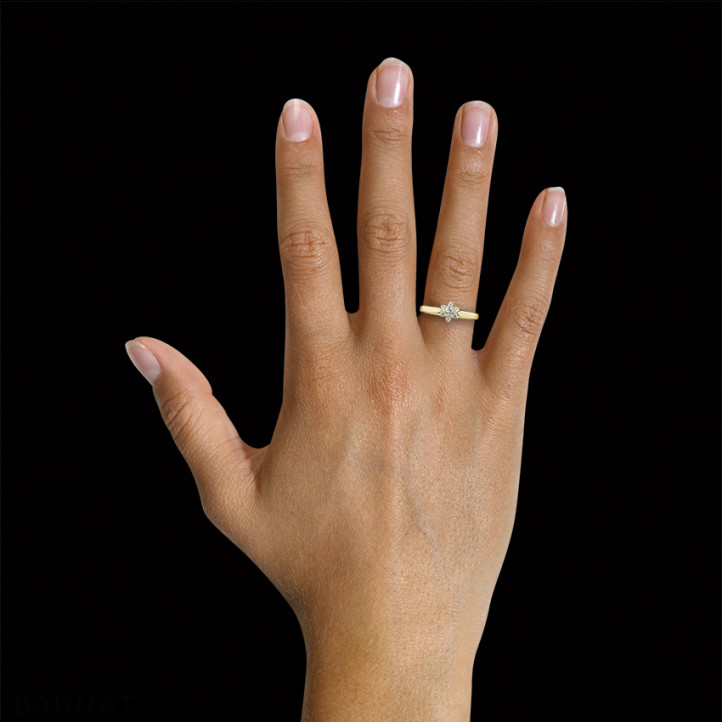 0.15 carat diamond flower ring in yellow gold