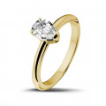 1.00 carat solitaire ring in yellow gold with pear shaped diamond