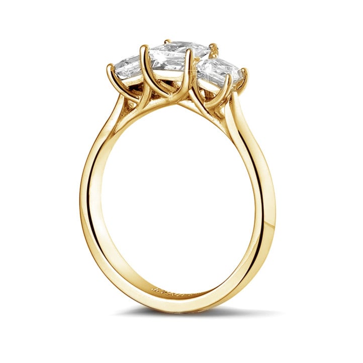1.05 carat trilogy ring in yellow gold with princess diamonds