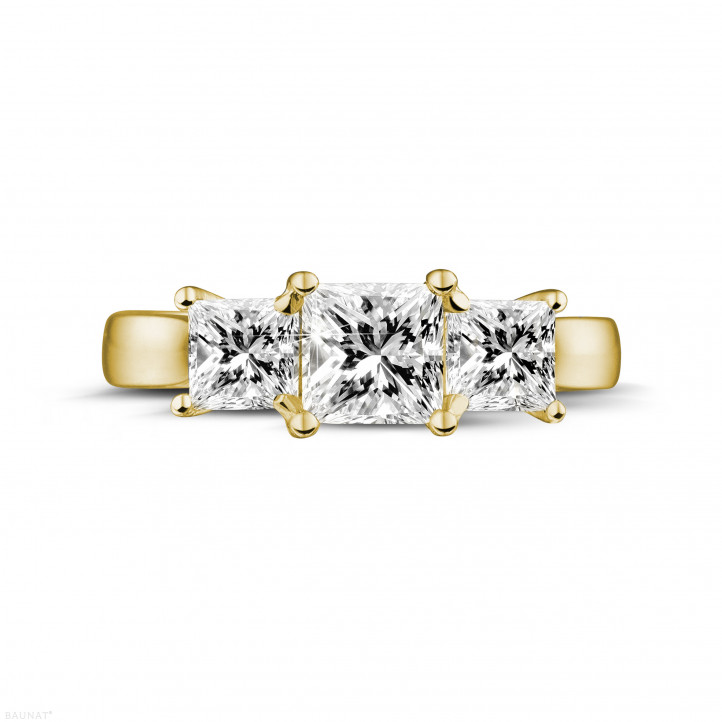 1.50 carat trilogy ring in yellow gold with princess diamonds
