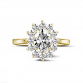 1.85 carat entourage ring in yellow gold with oval diamond
