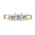 1.05 carat trilogy ring in yellow gold with princess diamonds