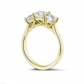 1.50 carat trilogy ring in yellow gold with princess diamonds