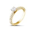 0.70 quilates anillo solitario (media banda) en oro amarillo con diamantes en los lados