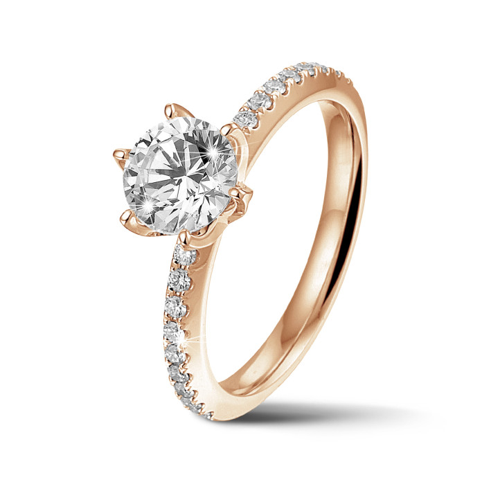 0.90 quilates anillo solitario en oro rojo con diamantes en los lados