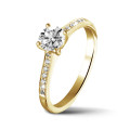 0.70 quilates anillo solitario en oro amarillo con 4 uñas y diamantes en los lados