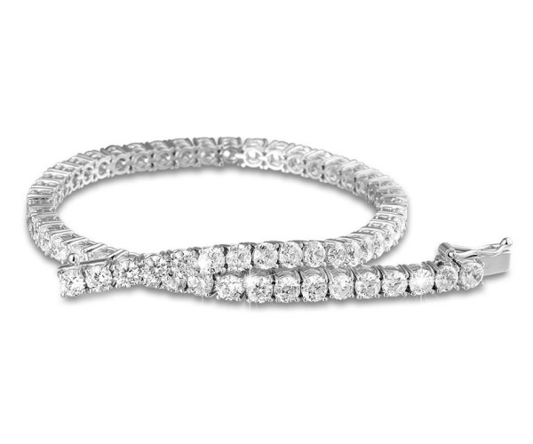 Pulsera de oro blanco con diamantes talla brillante en engaste pavé, diseño flexible y elegante