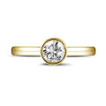 1.00 quilates anillo solitario en oro amarillo con un diamante redondo