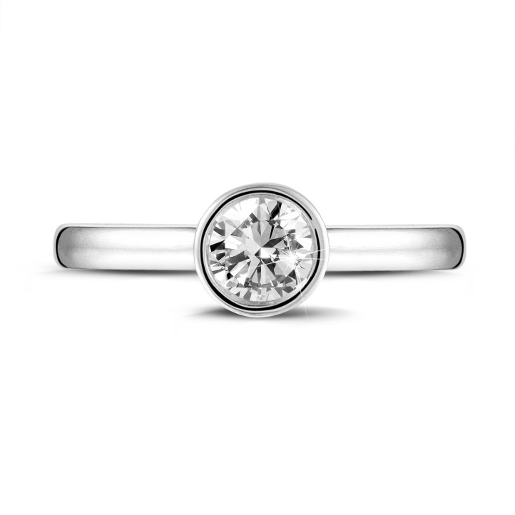 0.70 quilates anillo solitario en platino con un diamante redondo