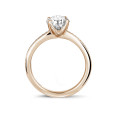 0.50 quilates anillo solitario en oro rojo con diamantes en los lados