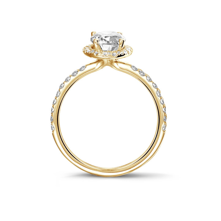 0.70 quilates anillo aureola en oro amarillo con diamante ovalado