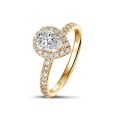 0.70 quilates anillo aureola en oro amarillo con diamante en forma de pera