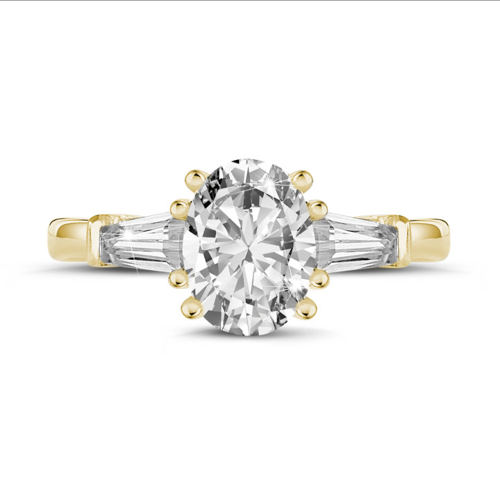 1.00 quilates anillo trilogía en oro amarillo con diamante ovalado y baguettes cónicos
