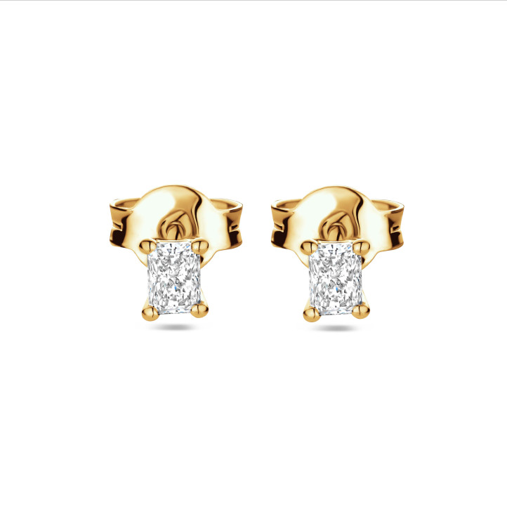 Pendientes solitarios 0.30 quilates con diamantes talla radiante en oro amarillo