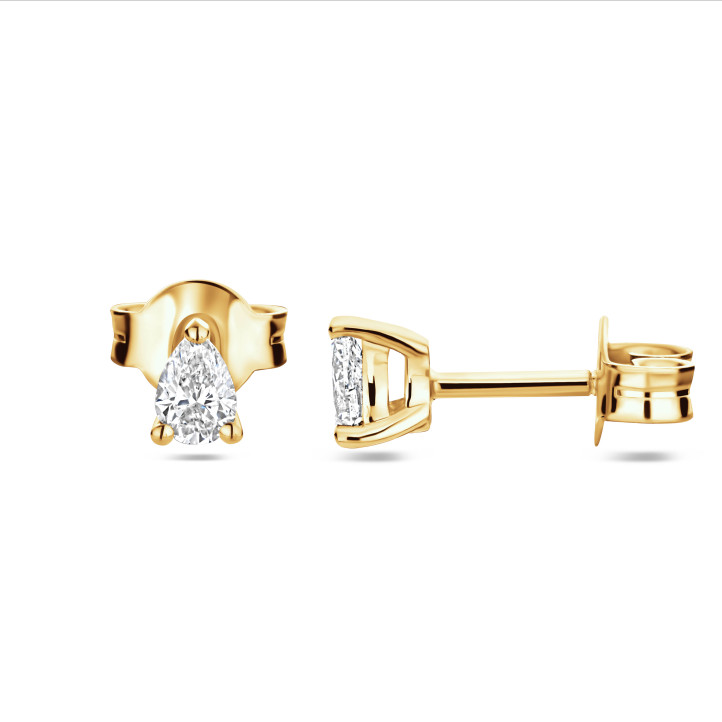 Pendientes solitario 0.30 quilates con diamantes talla pera en oro amarillo