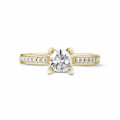 0.50 quilates anillo solitario diamante en oro amarillo con diamantes en los lados