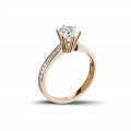 0.90 quilates anillo de oro rojo de diamantes con diamantes en los lados
