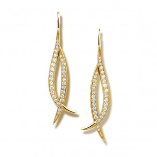 0.76 quilates pendientes diamantes diseño en oro amarillo
