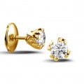 0.60 quilates pendientes diamantes diseño en oro amarillo con ocho garras