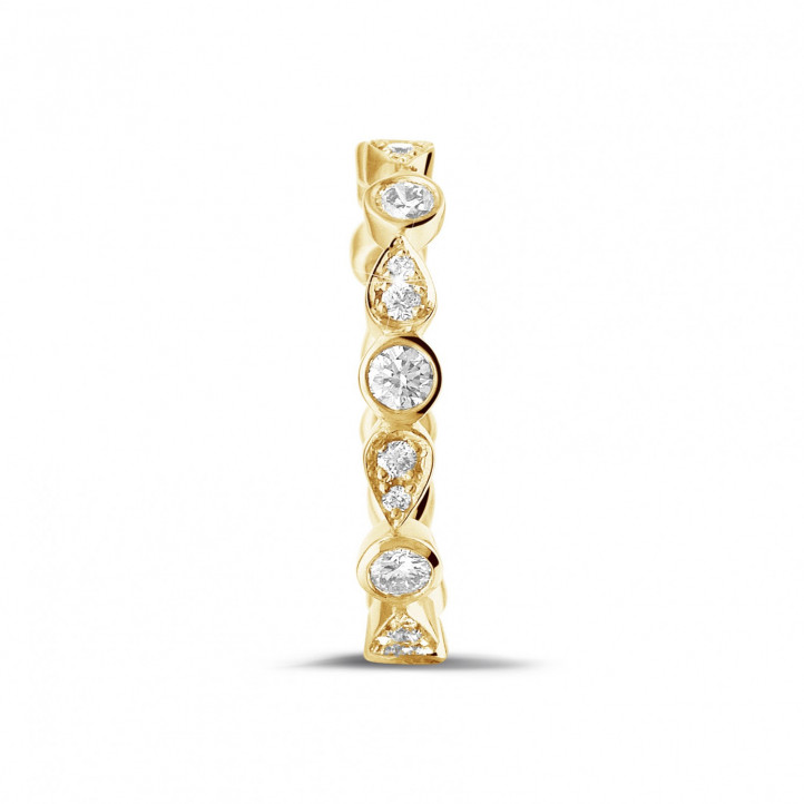 0.50 quilates alianza de combinación de diamantes en oro amarillo con diseño de pera