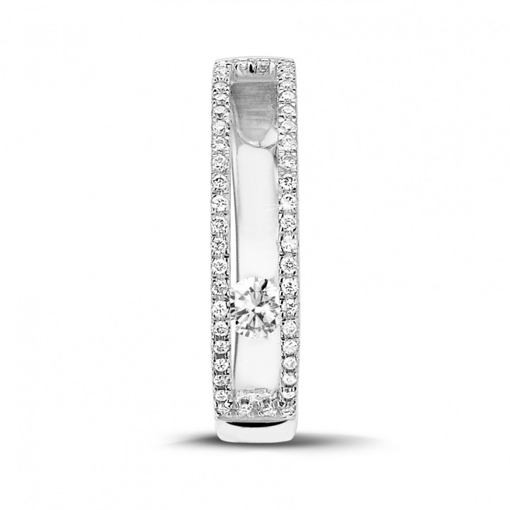 0.25 quilates anillo en oro blanco con un diamante redondo flotante