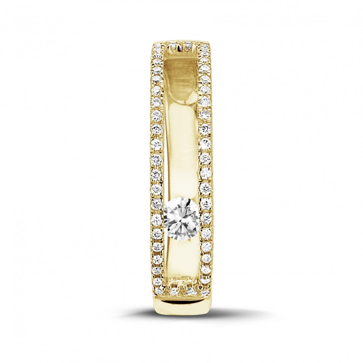 0.25 quilates anillo en oro amarillo con un diamante redondo flotante