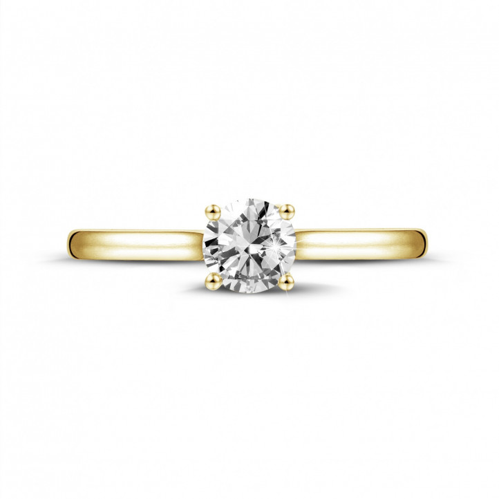 0.50 quilates anillo solitario en oro amarillo con un diamante redondo y 4 uñas