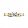 0.70 quilates anillo trilogía en oro amarillo con diamantes talla princesa