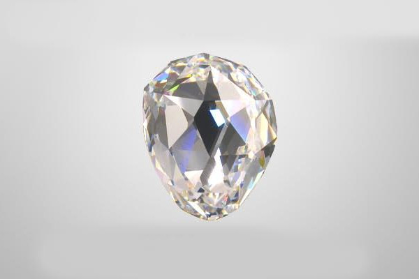 Un diamant clair mis en valeur sur un fond blanc, accentuant son éclat et ses facettes élégantes.