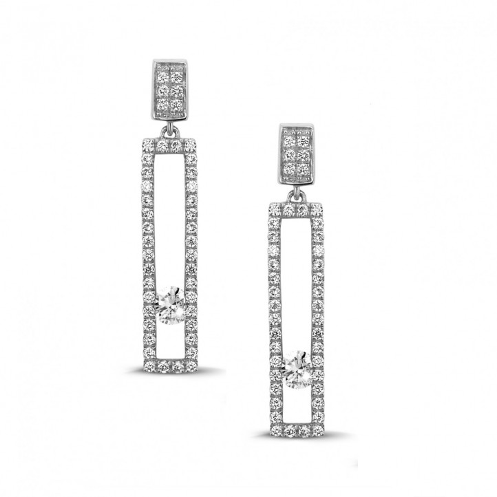 0.55 carat boucles d’oreilles en or blanc avec diamants ronds flottants