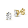 2.00 carats Boucles d'oreilles en or jaune avec diamant oval solitaire