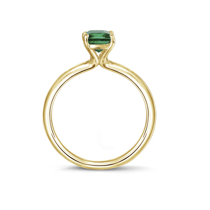 Bague solitaire en or jaune avec une émeraude