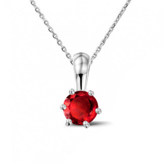 Colliers - Pendentif solitaire en or blanc avec un rubis rond