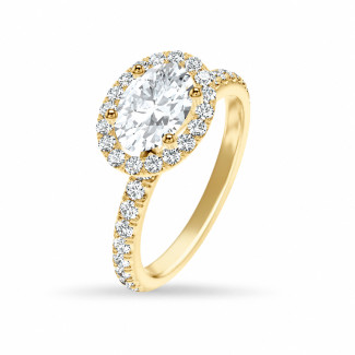 Bague halo ovale sur mesure, sertie d'un diamant central monté à l'horizontale (est-ouest).
