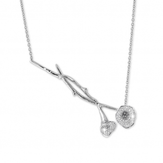 Colliers - 0.73 carat collier pendentif brindille en platine avec diamants
