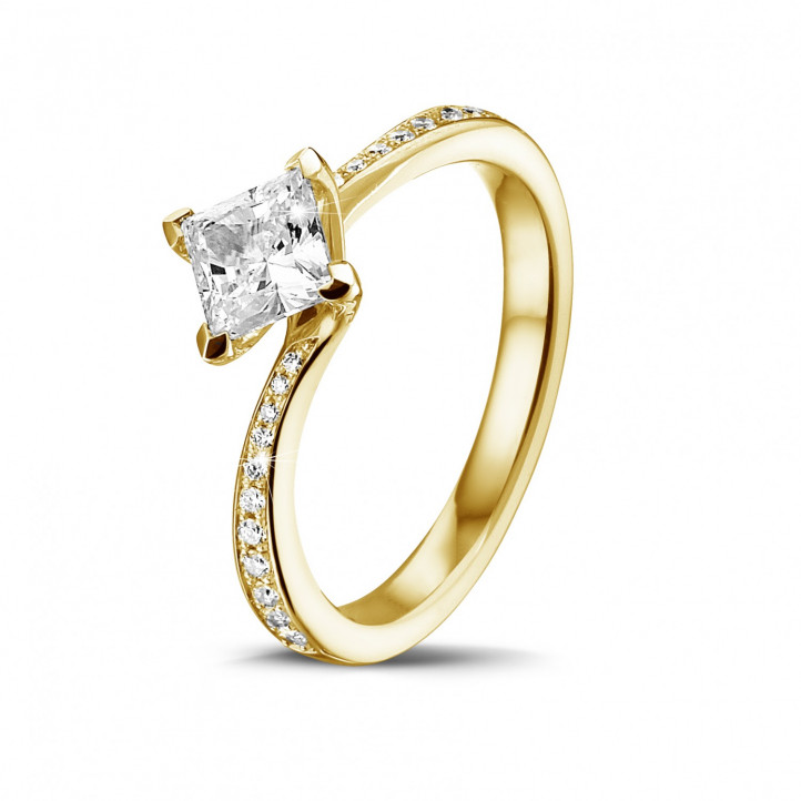 0.70 carat bague solitaire en or jaune avec diamant princesse et diamants sur le côté