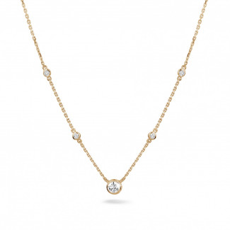 Colliers - 0.45 carat collier satellite en or rouge et diamants