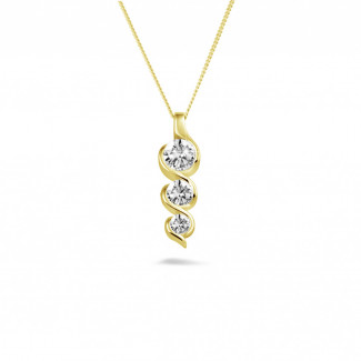 Colliers - 0.85 carat pendentif trilogie en or jaune avec diamants