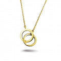 0.20 carat pendentif design infinity en or jaune avec diamants