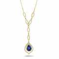 Collier en diamant et or jaune avec saphir en forme de poire